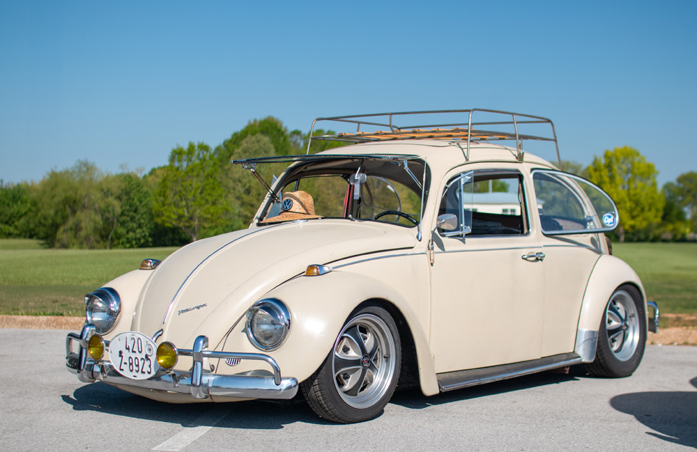 White standard VW Bug at a VW show